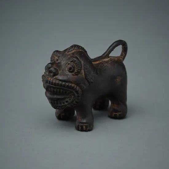 Nepalese bronze pug-nosed lion figure,